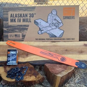 A 30" Alaskan small log mill, a Chainsaw Bar, and a Ripping Chain are displayed on the logs.
